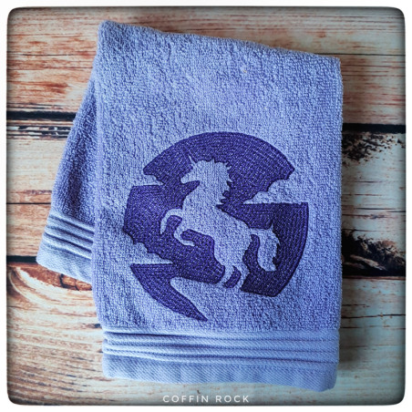 Serviette brodée licorne