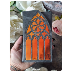 portefeuille cathédrale vitrail soleil couchant