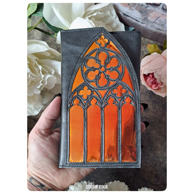 portefeuille cathédrale vitrail soleil couchant